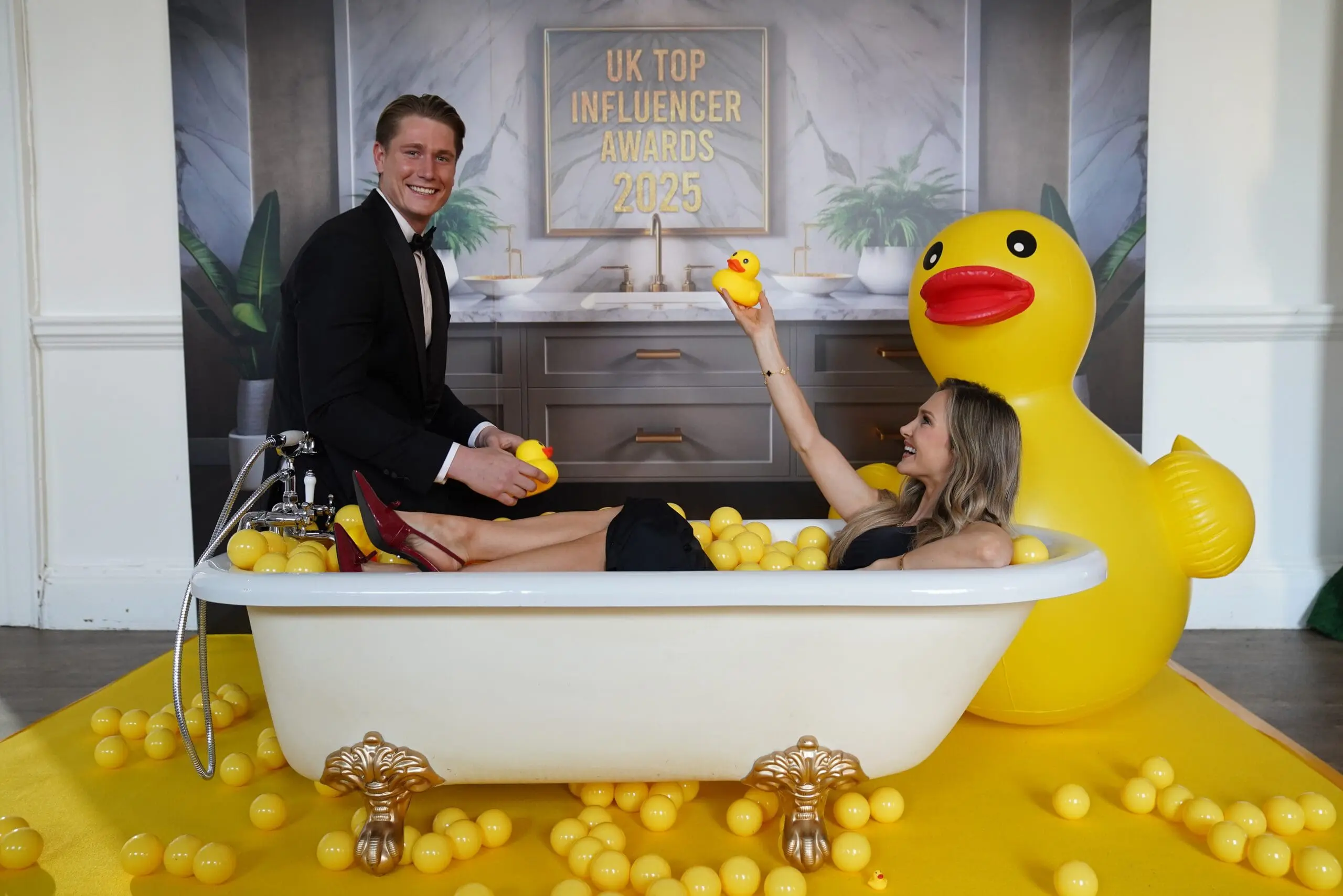 DSC00831 Farmer Will and Jessie Wynter in a bath of rubber ducks at The UK Top Influencer Awards 2025
