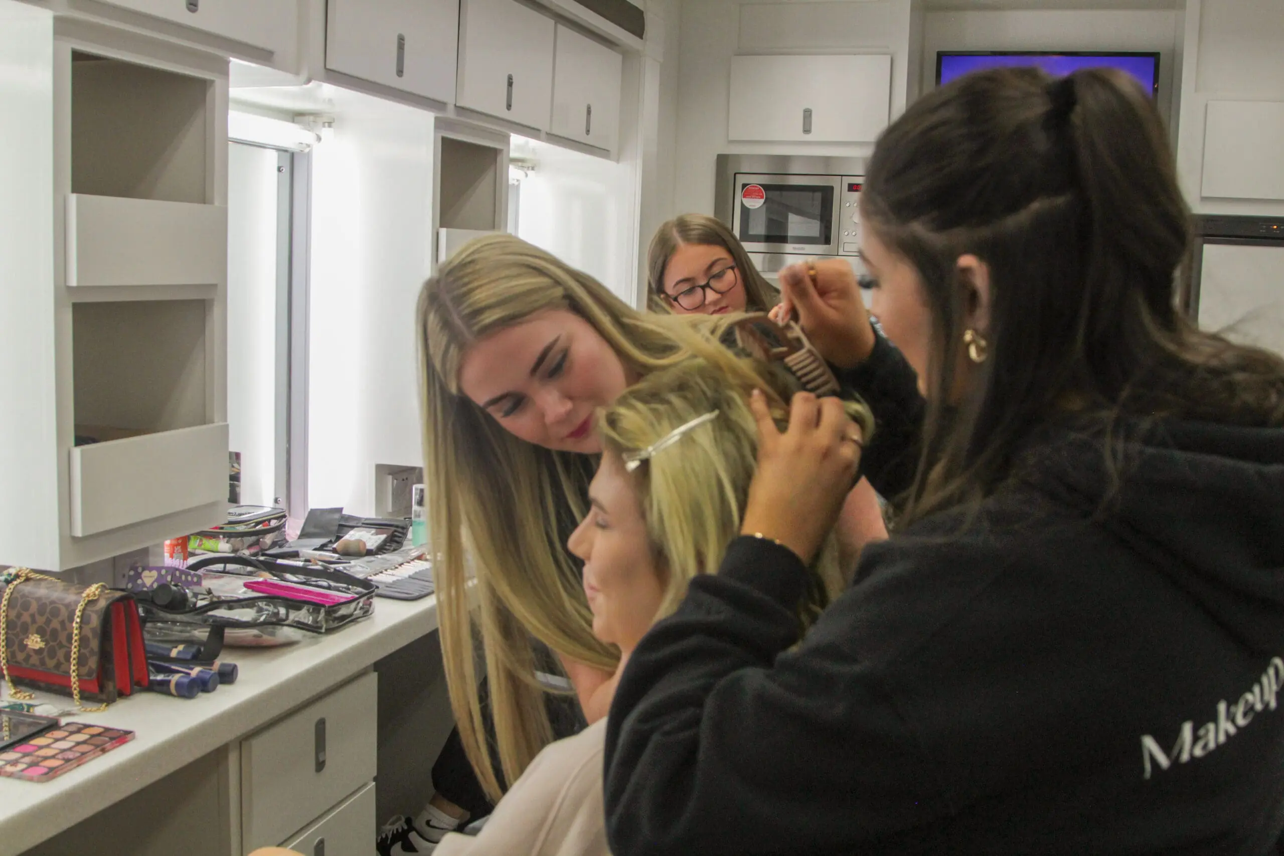 Middlesbrough College Hair and Media Makeup students, in the makeup truck on their work experience placements at The UK Top Influencer Awards 2025